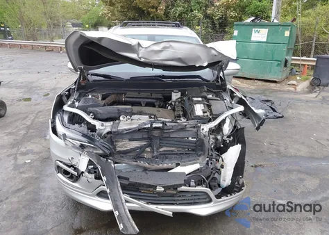 2017 Buick Envision Essence z USA, uszkodzony, nr VIN LRBFXBSA3HD045489